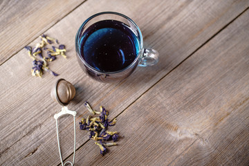 Pea tea, butterfly blue tea in glass mug, herbal detox drink. Anchan. Herbal hot or cold beverage