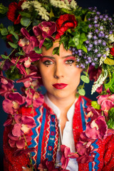 beautiful caucasian woman with vivid flower crown