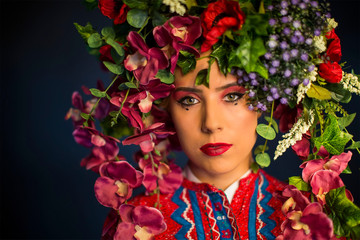 beautiful caucasian woman with vivid flower crown