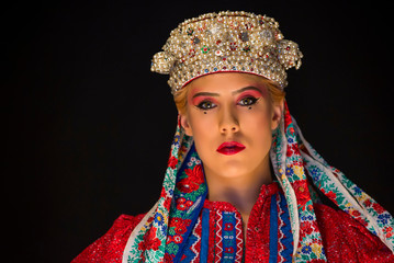 folk clothes and pearl crown on a woman 