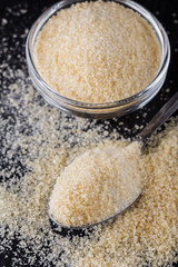 natural animal gelatin on a dark stone background