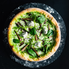seafood pizza with broccoli, spinach and arugula salad