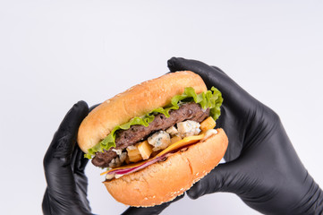  phased assembly of a hamburger on a white background26