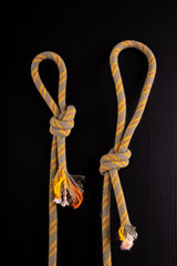 Two loops made of thick rope. Loop-shaped knot.