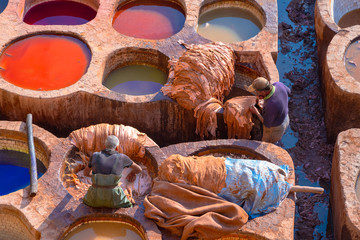 Leather dying in a traditional tannery in the city Fes, Morocco