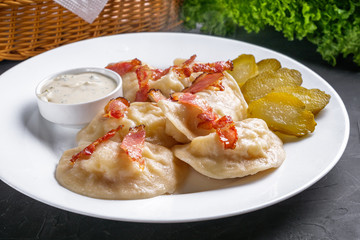 traditional Ukrainian dish of dumplings with sour cream