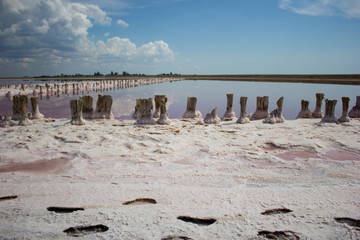 Clouds landscape water and horizon - salt mining plant