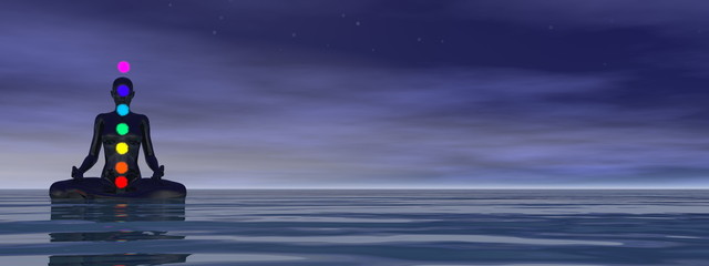 Woman meditating upon the ocean and chakra colors - 3D render