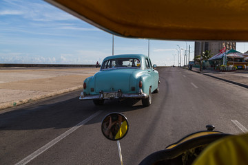 Following an old timer on the Malecon