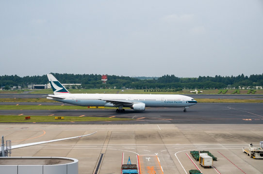 Cathay Pacific Airways on the airport tarmac 