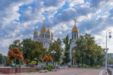 Fototapeta na wymiar Summer cityscape with Christ the Savior Cathedral and Chapel of the Blessed Prince Peter and Fevronia on Victory Square in the city Kaliningrad (Koenigsberg), Russia.