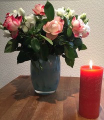 roses in vase on the table