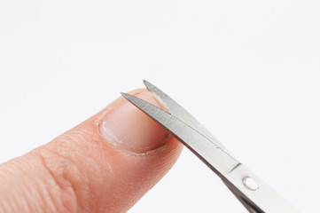 Nail care. Closeup of hands getting manicure isolated on white background. Copy space.