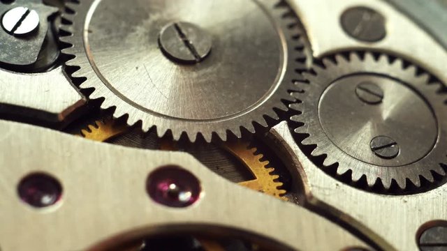 Two gears rotate, close up