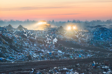 dump trucks on the trash