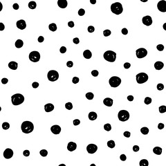 Dot doodles seamless pattern. Hand drawn circles texture. Dots background.