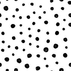 Dot doodles seamless pattern. Hand drawn circles texture. Dots background.