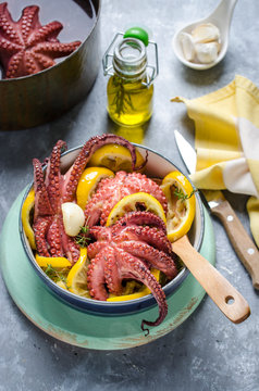 Hot octopus salad with roasted lemon and garlic