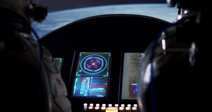 Astronauts navigating spaceship through space