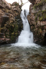 Fototapeta na wymiar massive waterfall in the western part of Scotland, fresh water from the mountains in westen Scotland