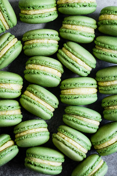 Matcha macarons with mango buttercream