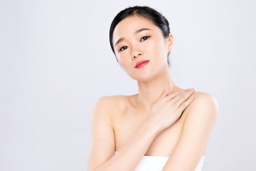 Beautiful Young Asian Woman with Clean Fresh Skin. Face care, Facial treatment, on white background, Beauty and Cosmetics Concept.