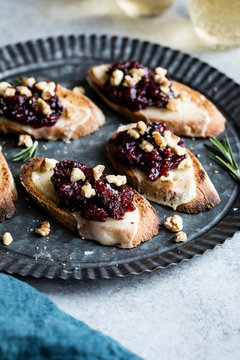 Cheese crostini with rosemary cranberry fig jam