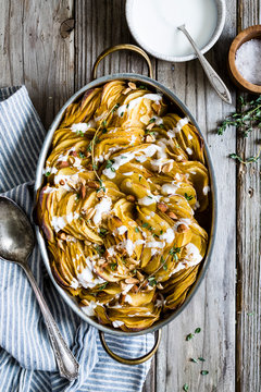 Smoked Paprika Roasted Hasselback Potato Gratin - Complete With A Garlic Yogurt Drizzle