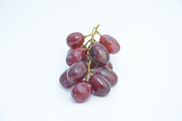 Fresh bunch of grapes on white background.