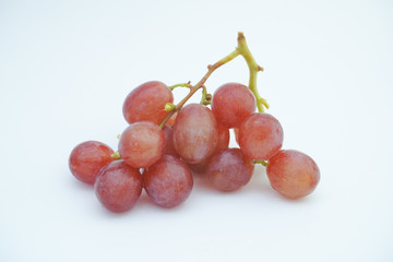 Fresh bunch of grapes on white background.