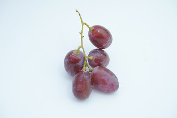 Fresh bunch of grapes on white background.