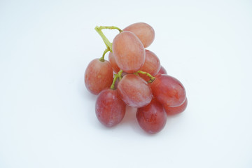 Fresh bunch of grapes on white background.