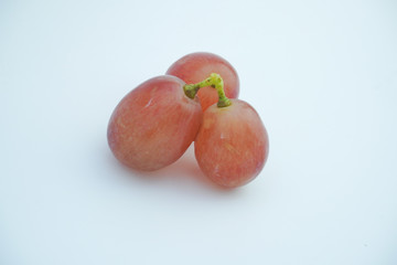 Fresh bunch of grapes on white background.