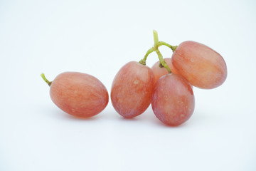 Fresh bunch of grapes on white background.