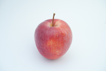 Fresh red apple on white background.
