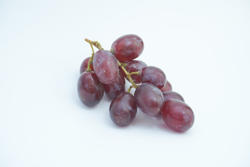 Fresh bunch of grapes on white background.