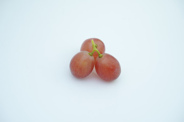 Fresh bunch of grapes on white background.