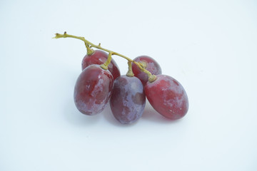 Fresh bunch of grapes on white background.