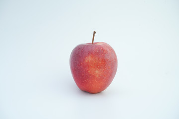 Fresh red apple on white background