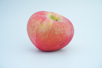 Fresh red apple on white background.