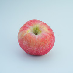 Fresh red apple on white background.