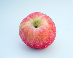 Fresh red apple on white background.