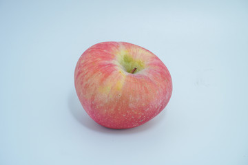 Fresh red apple on white background.