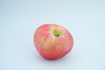 Fresh red apple on white background.