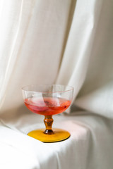 Cocktail with champagne and raspberries