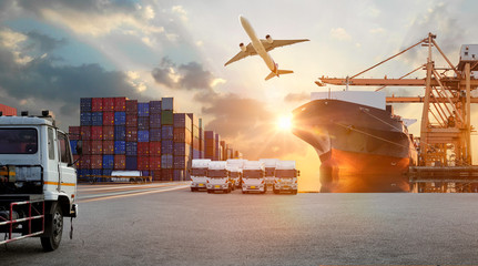 Logistics and transportaIndustrial Container Cargo freight ship, forklift handling container box...