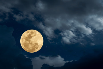 Fototapeta na wymiar Full moon with blurred cloud at night.