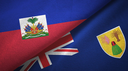 Haiti and Turks and Caicos Islands two flags textile cloth, fabric texture
