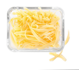 Glass bowl with grated cheese isolated on white, top view