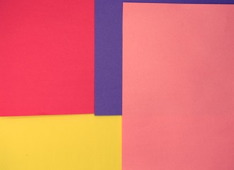 Construction paper background, red, purple, pink, and yellow